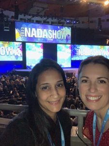 Attorney Shalini Natesan and Attorney Megan Bassler attending the National Auto Dealers Association Trade Show