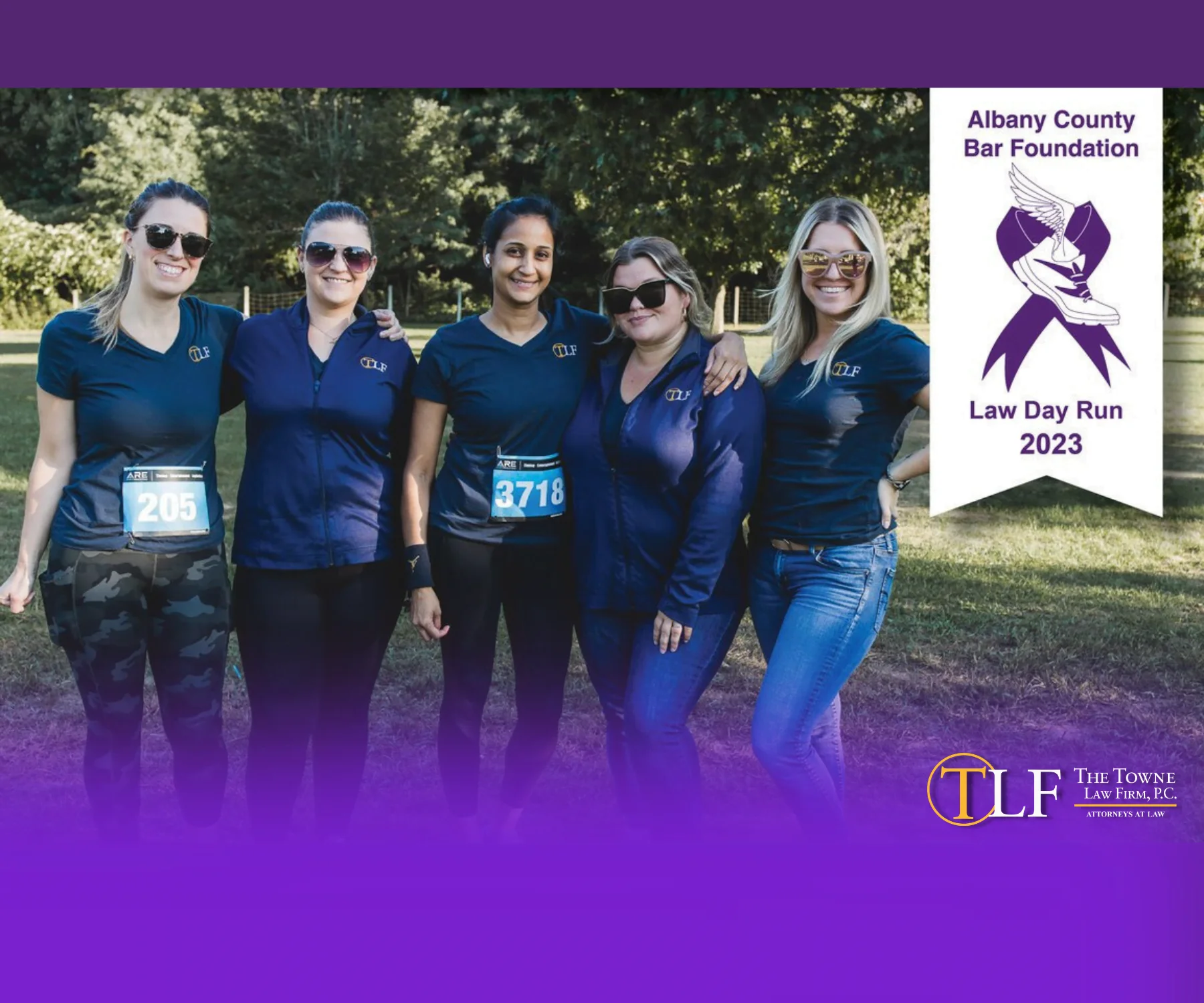 Photo of women at a 5K race with The Albany County Bar Foundation Law Day 5K logo and The Towne Law Firm logo