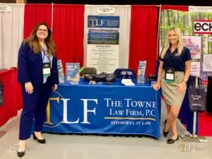Associate Claire Stratton and Kate Gagnon at TLF tradeshow booth