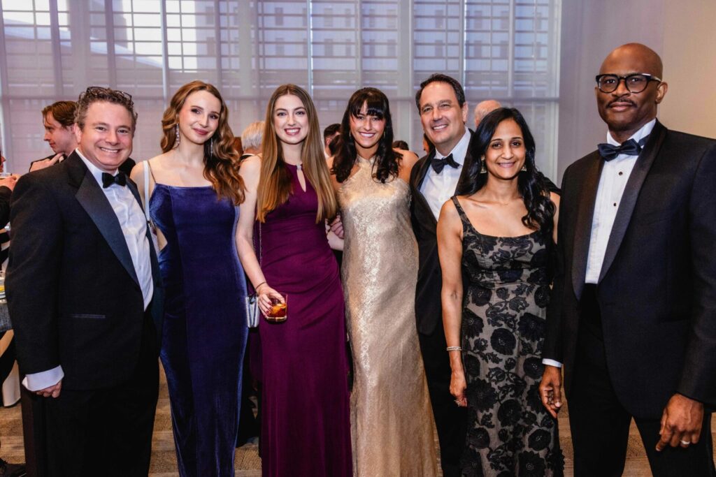 Group of attorneys at a black tie event.