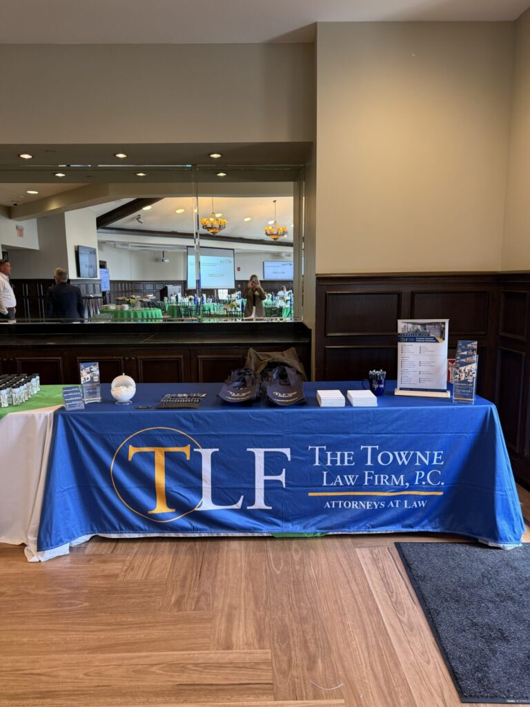 The Towne Law Firm table display at ENYCAR Operational Excellence Forum.