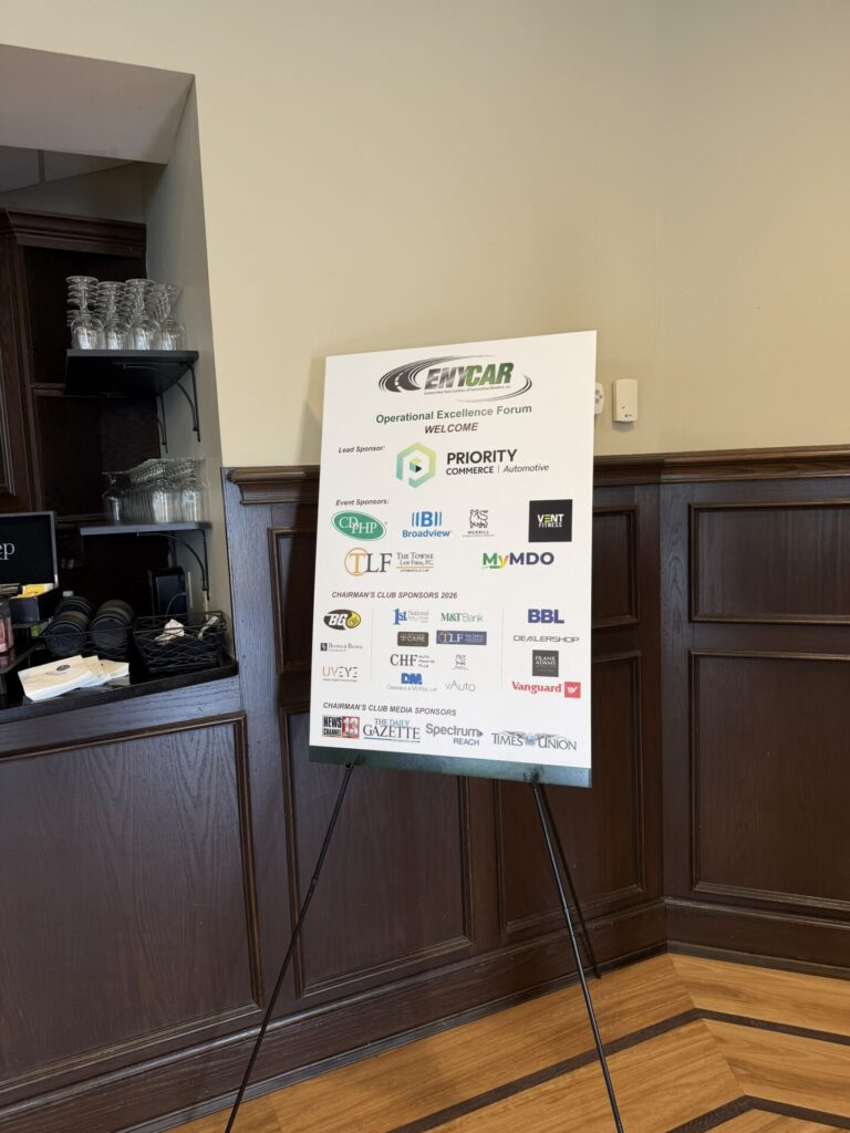 Sponsor signage at ENYCAR Operational Excellence Forum.